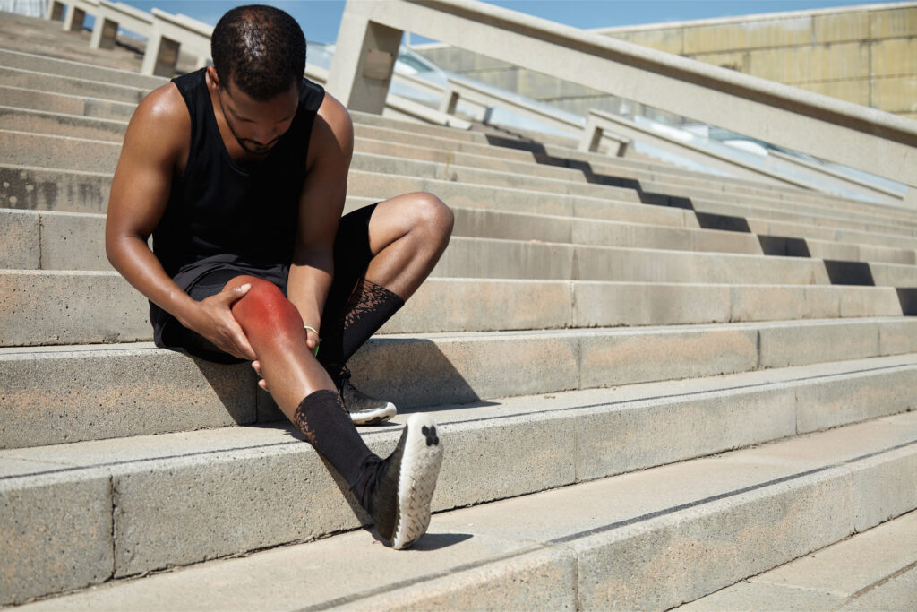 The current image has no alternative text. The file name is: closeup-young-man-with-knee-injury-scaled.jpg