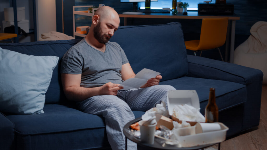 The current image has no alternative text. The file name is: confused-frustrated-stressed-young-man-reading-letter-scaled.jpg